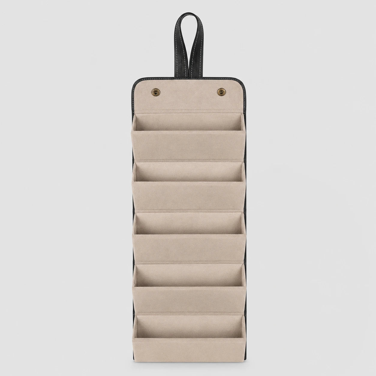 HARO Leather Travel Case open showing five compartments with microfiber dividers